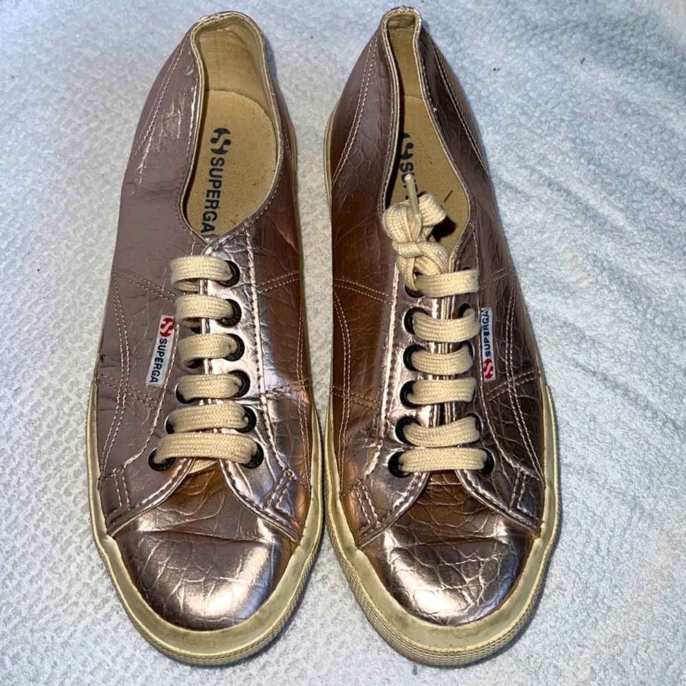 Superga pink (rose gold) metallic sneakers size 9. In good used condition.